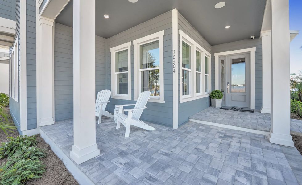 Exterior details and patio area of a home in Laureate Park, Orlando (Image 22).