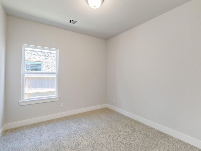 Spacious, unfurnished interior of a new home in Sunterra, Katy (Image 33).