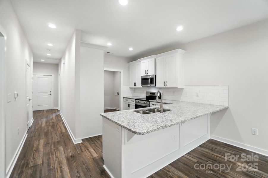 Furnished interior view inside a new home in , Hickory (Image 7).