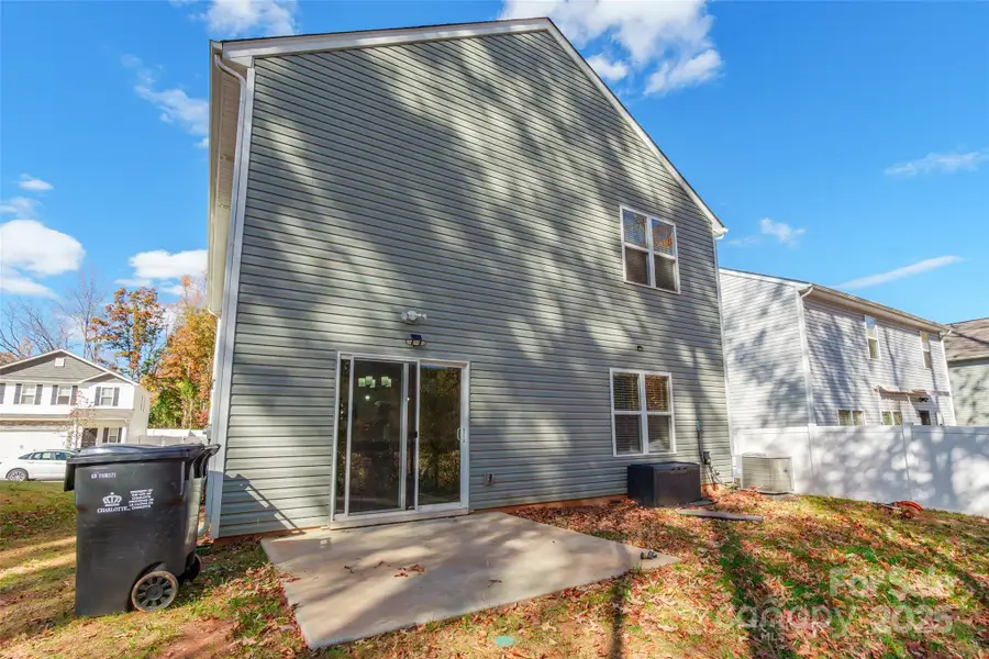 Exterior details and patio area of a home in McGee Place, Charlotte (Image 4).