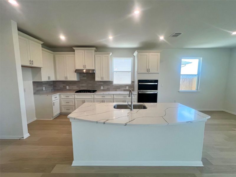 Furnished interior view inside a new home in Porter Country, Buda (Image 4).