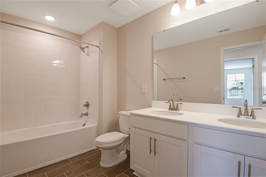 Furnished interior view inside a new home in Seasons at Summit Ridge, Apopka (Image 18).