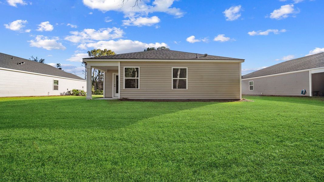 Exterior details and patio area of a home in The Retreat at East Argent, Ridgeland (Image 4).