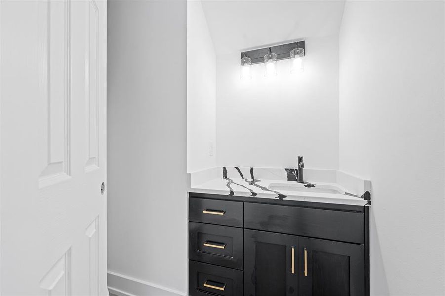 Bathroom featuring vanity Bathroom featuring vanity
