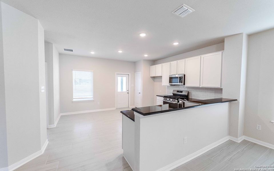 Furnished interior view inside a new home in Morgan Meadows, San Antonio (Image 5). Furnished interior view inside a new home in Morgan Meadows, San Antonio (Image 5).