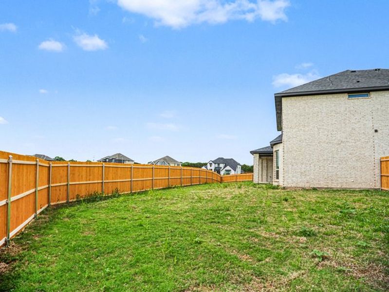 Exterior details and patio area of a home in Ten Mile Creek Estates, DeSoto (Image 17). Exterior details and patio area of a home in Ten Mile Creek Estates, DeSoto (Image 17).