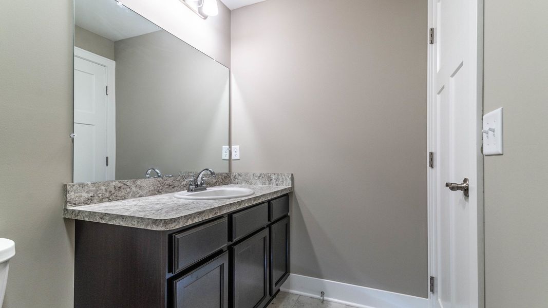 Representative furnished interior of a home built from the The Winslow by Norfolk Homes in Valleys, Jackson (Image 42).