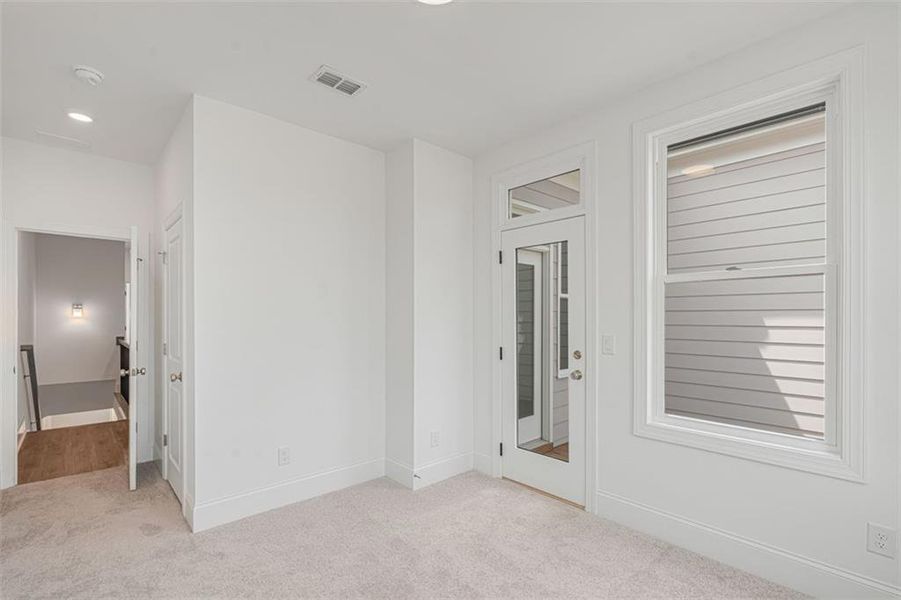 Spacious, unfurnished interior of a new home in Waterhaven, Cumming (Image 24).