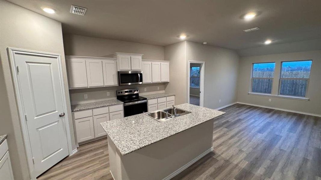 Kitchen - All Home and community information, including pricing, included features, terms, availability and amenities, are subject to change at any time without notice or obligation. All Drawings, pictures, photographs, video, square footages, floor plans, elevations, features, colors and sizes are approximate for illustration purposes only and will vary from the homes as built.