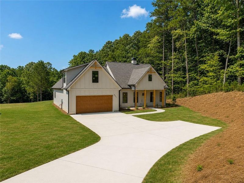 Front exterior of a new home in , Ellijay, GA, highlighting curb appeal (Image 2). Front exterior of a new home in , Ellijay, GA, highlighting curb appeal (Image 2).