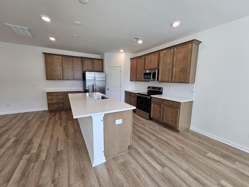 Furnished interior view inside a new home in Creekside at Andrews, Summerville (Image 9).