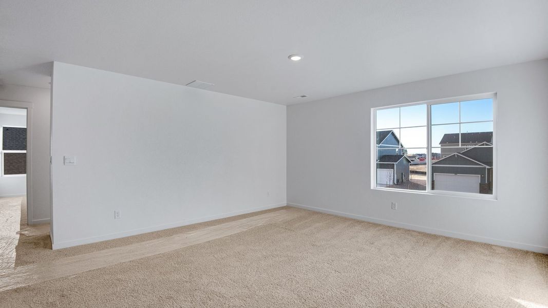 Spacious, unfurnished interior of a new home in Silver Peaks, Lochbuie (Image 26).