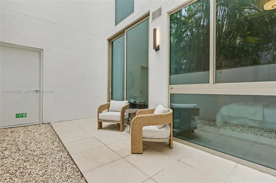 Exterior details and patio area of a home in 2200 Brickell, Miami (Image 1). Exterior details and patio area of a home in 2200 Brickell, Miami (Image 1).