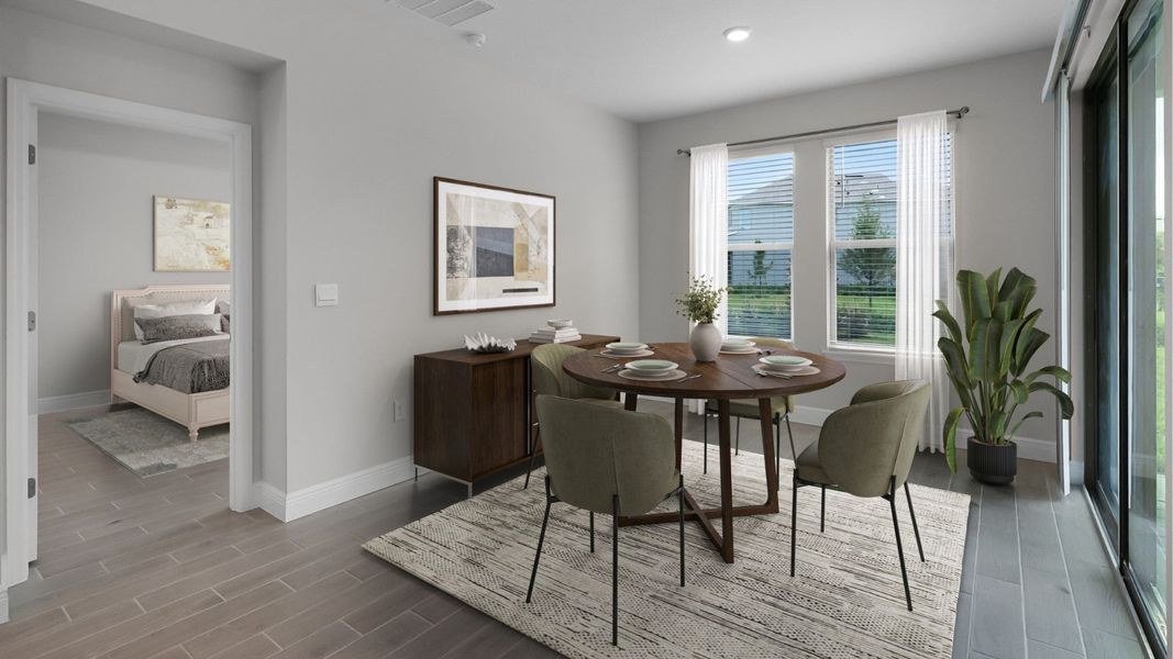 Representative furnished interior of a home built from the BELLMORE by D.R. Horton in Waterleigh, Winter Garden (Image 7).