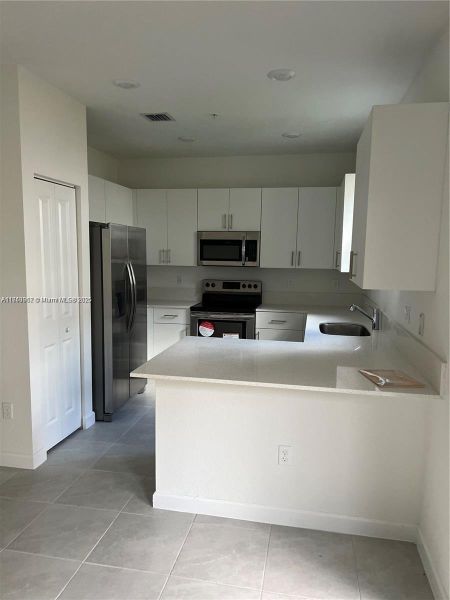 Furnished interior view inside a new home in , Pembroke Pines (Image 14).