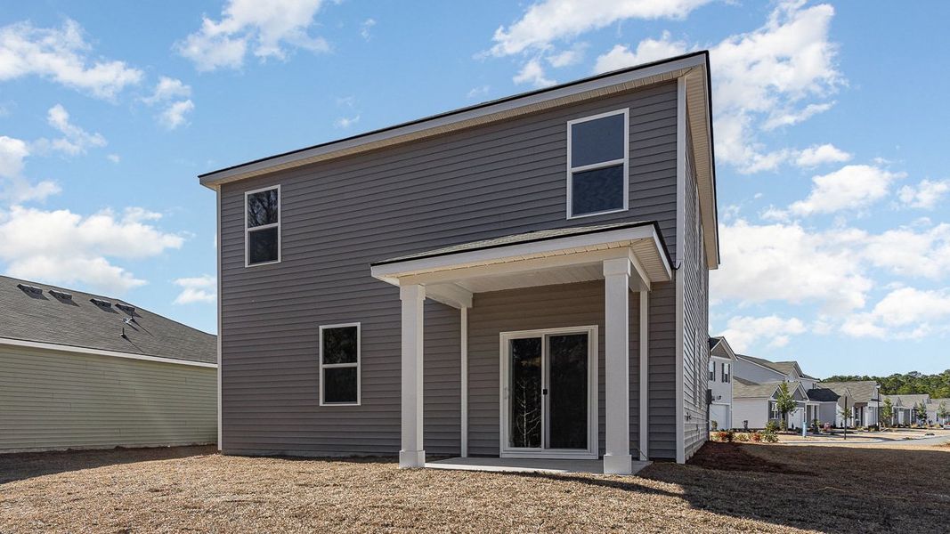 Exterior details and patio area of a home in Sandridge Park, Little River (Image 3).