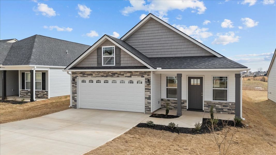 Representative exterior photo of a completed home built from the Ellison by Enchanted Homes in Hampshire Heights, Moore, SC (Image 19).