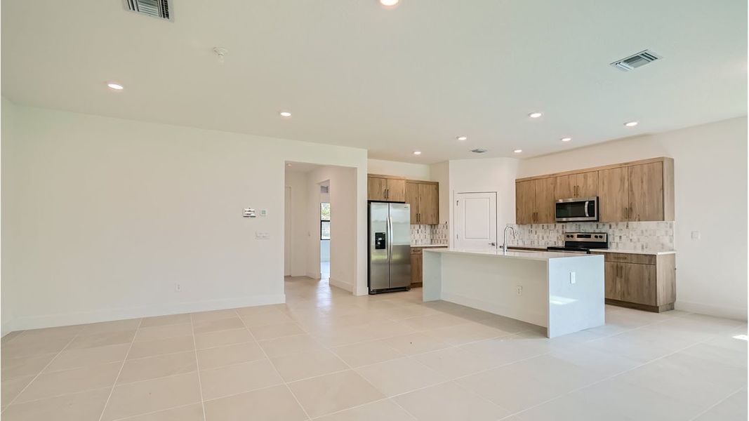 Representative unfurnished interior of a home built from the Avon by D.R. Horton in Preserves at Park Trace, Stuart (Image 11).