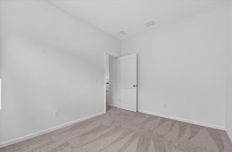 Spacious, unfurnished interior of a new home in Pender Woods at Cane Bay, Summerville (Image 21).
