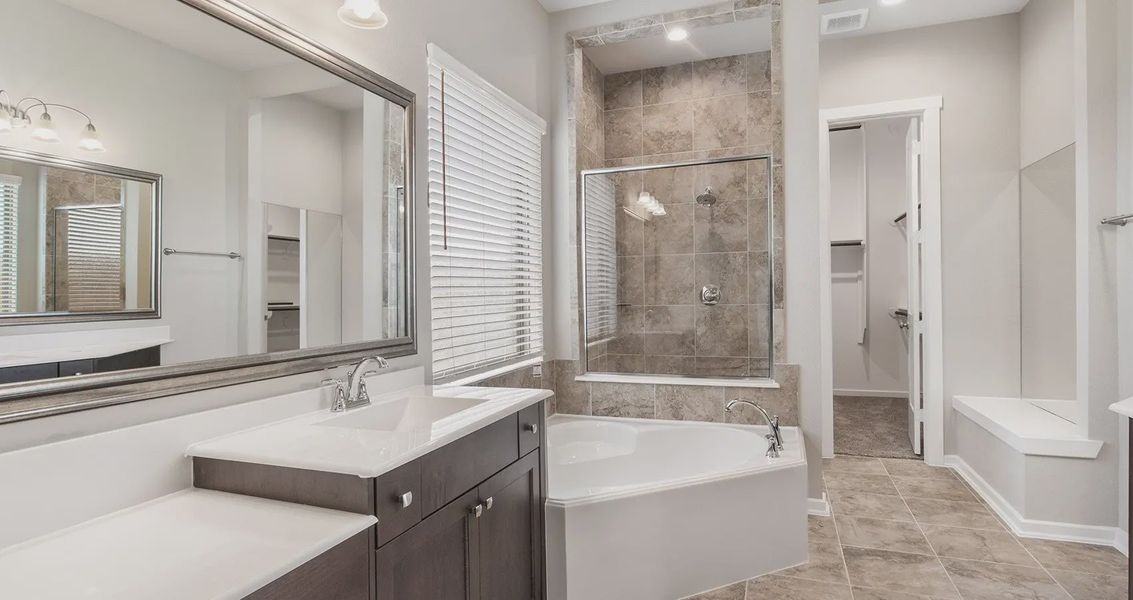 Representative furnished interior of a home built from the Pendleton by Chesmar Homes in The Woodlands Hills, Willis (Image 7).