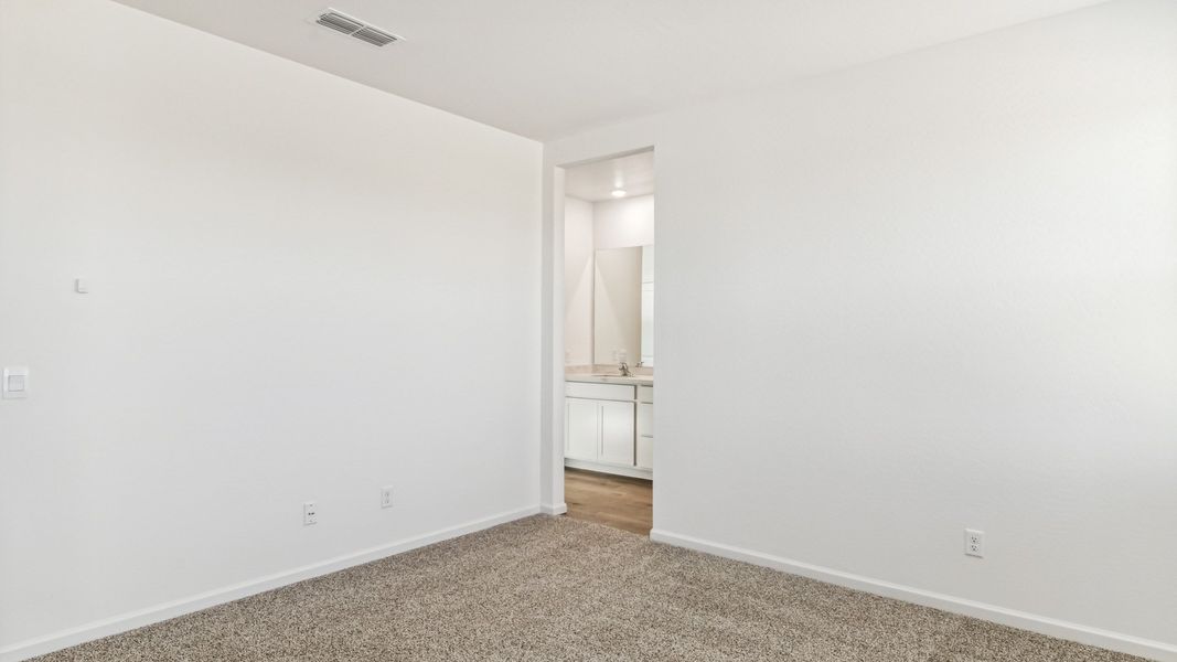 Spacious, unfurnished interior of a new home in Copper Falls, Buckeye (Image 14). Spacious, unfurnished interior of a new home in Copper Falls, Buckeye (Image 14).