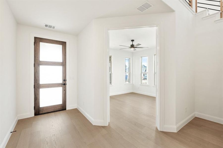 Spacious, unfurnished interior of a new home in Painted Tree Woodland District 50, McKinney (Image 28).