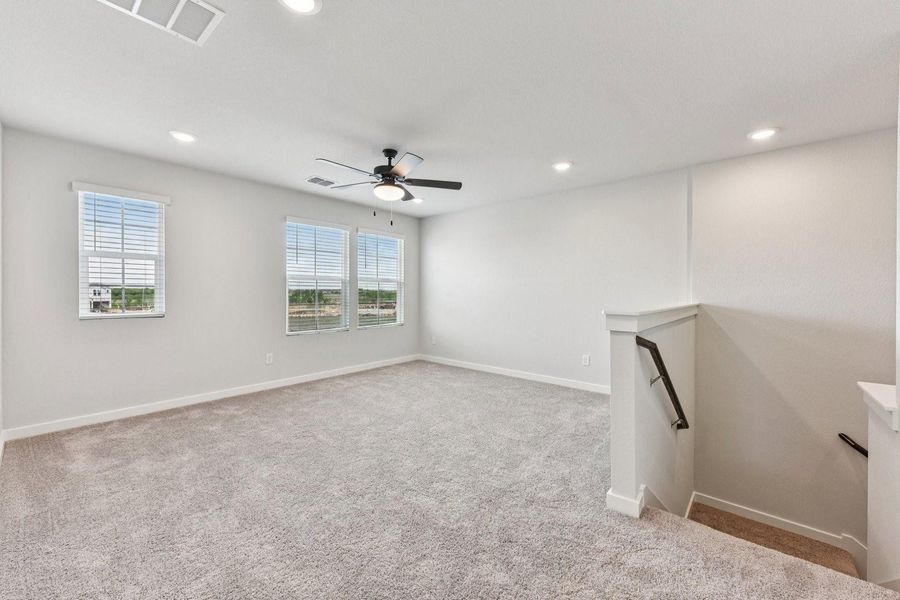 Spacious, unfurnished interior of a new home in Stallion Run, Buda (Image 27).