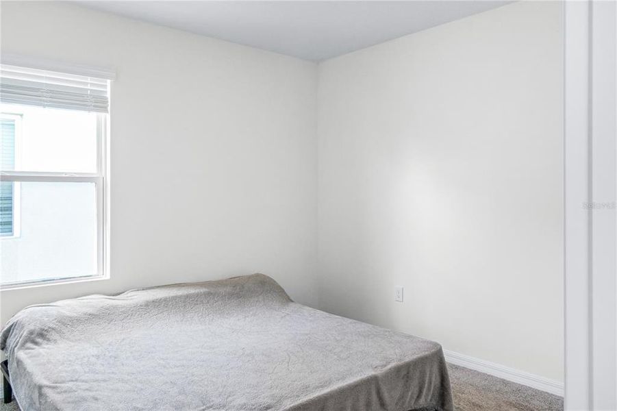 Furnished interior view inside a new home in Eagle Hammock, Eagle Lake (Image 12).