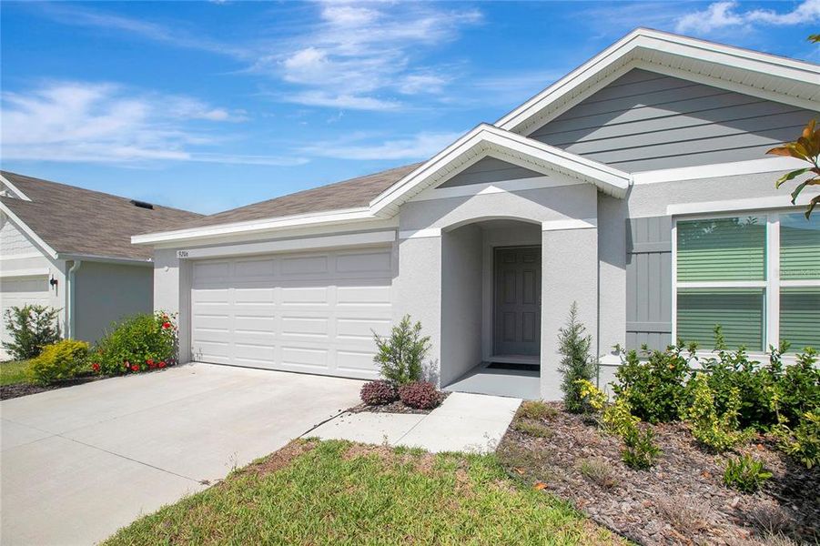 Front exterior of a new home in River Park, Temple Terrace, FL, highlighting curb appeal (Image 28).