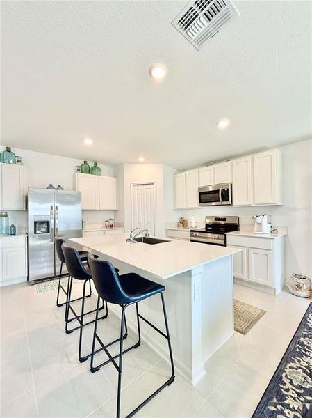 Furnished interior view inside a new home in Ranches at Lake McLeod, Eagle Lake (Image 7).