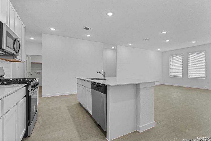 Furnished interior view inside a new home in Hidden Trails: Coastline Collection, Bulverde (Image 6).