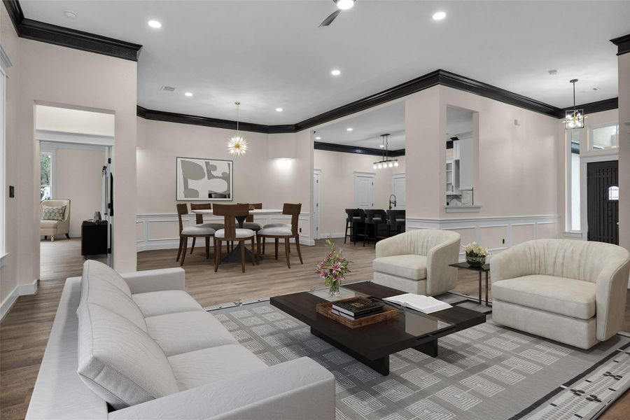 Welcome to your living room and dining space. Again, notice all the special touches with trim and lighting. In the dining space in each back corner is lighted display areas not really visible in photo. This room has been virtually staged to show you what it could look like with furniture. Welcome to your living room and dining space. Again, notice all the special touches with trim and lighting. In the dining space in each back corner is lighted display areas not really visible in photo. This room has been virtually staged to show you what it could look like with furniture.