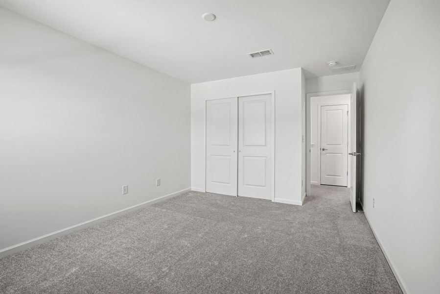 Spacious, unfurnished interior of a new home in Michaux Gardens, Belmont (Image 61).