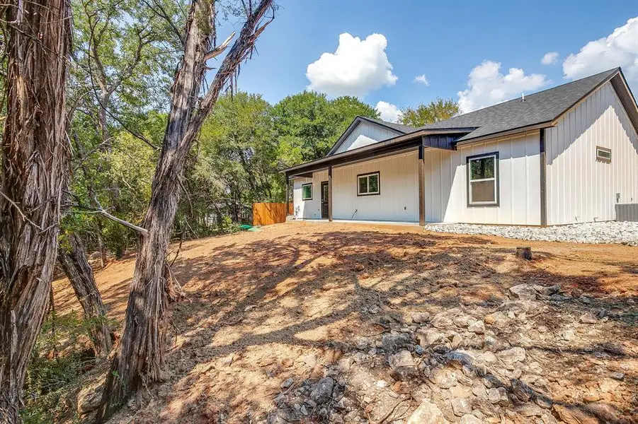 Front exterior of a new home in , Rio Vista, TX, highlighting curb appeal (Image 2). Front exterior of a new home in , Rio Vista, TX, highlighting curb appeal (Image 2).