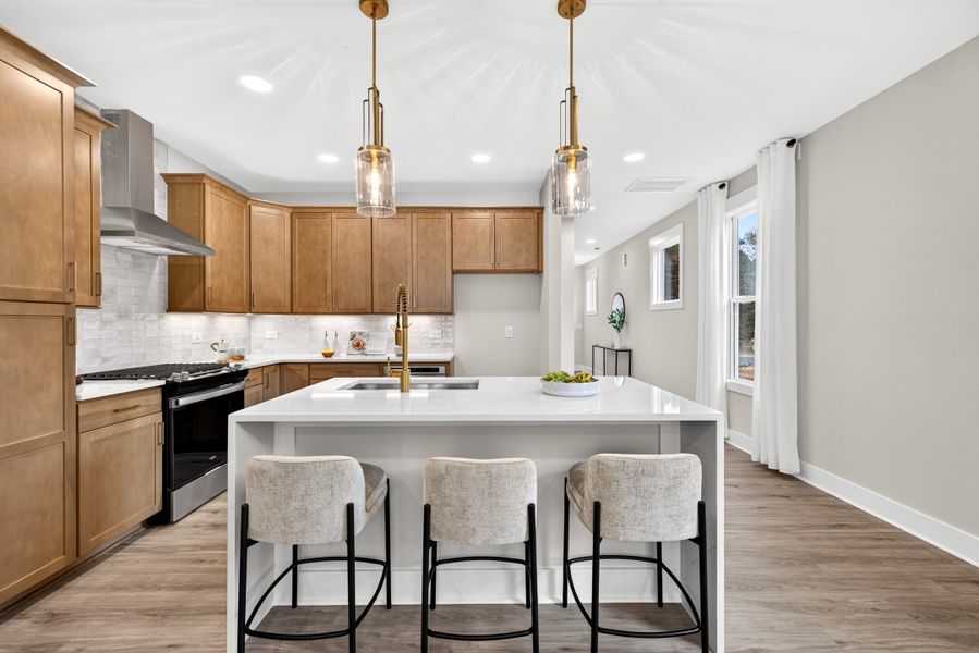 Representative furnished interior of a home built from the Weston End Unit by Baker Residential in Parc at Bradley Farm, Apex (Image 10).