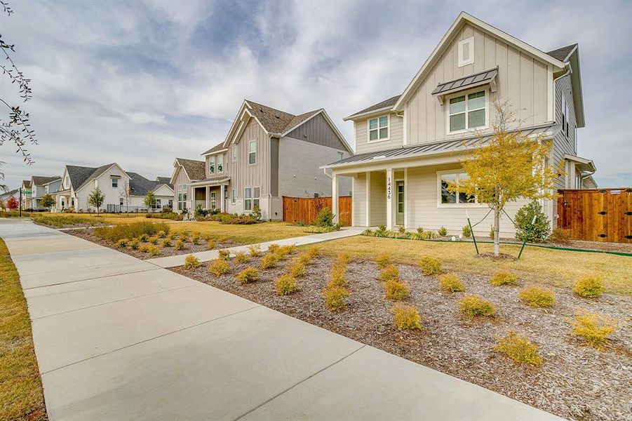 Front exterior of a new home in Walsh, Fort Worth, TX, highlighting curb appeal (Image 24). Front exterior of a new home in Walsh, Fort Worth, TX, highlighting curb appeal (Image 24).