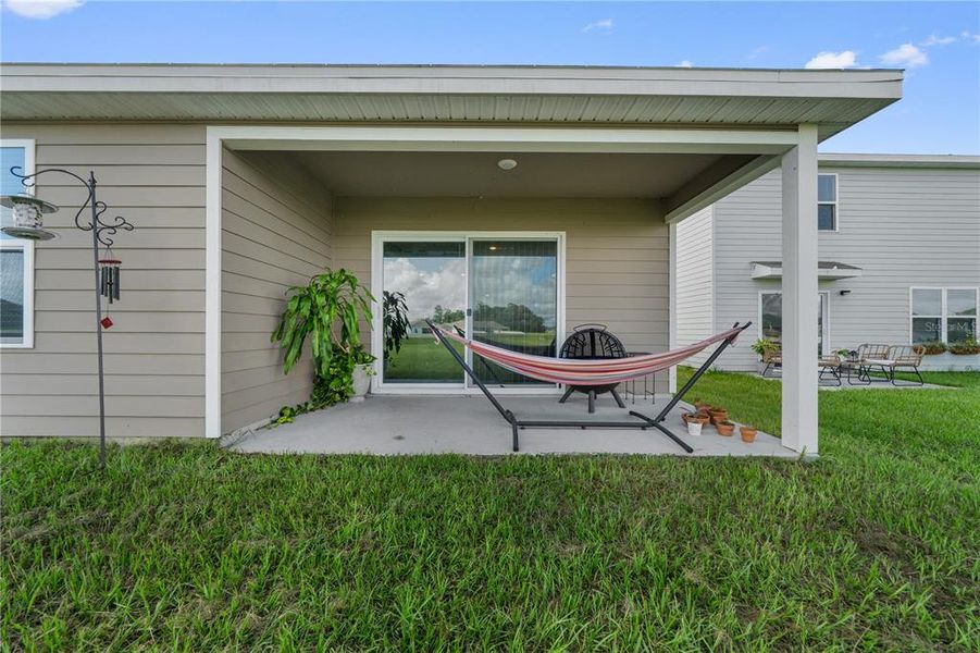 Exterior details and patio area of a home in Avalon Woods, Newberry (Image 36).
