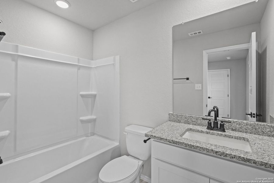 Furnished interior view inside a new home in Comanche Ridge, San Antonio (Image 63). Furnished interior view inside a new home in Comanche Ridge, San Antonio (Image 63).