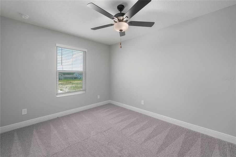 Spacious, unfurnished interior of a new home in Gum Lake Preserve, Lake Alfred (Image 32).