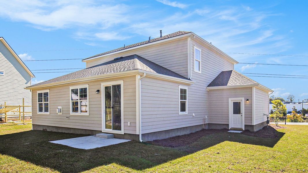 Exterior details and patio area of a home in Belle Park, North Myrtle Beach (Image 3).