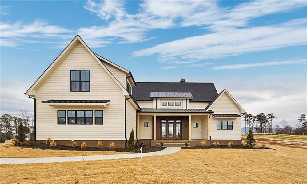 Front exterior of a new home in , Rydal, GA, highlighting curb appeal (Image 26).