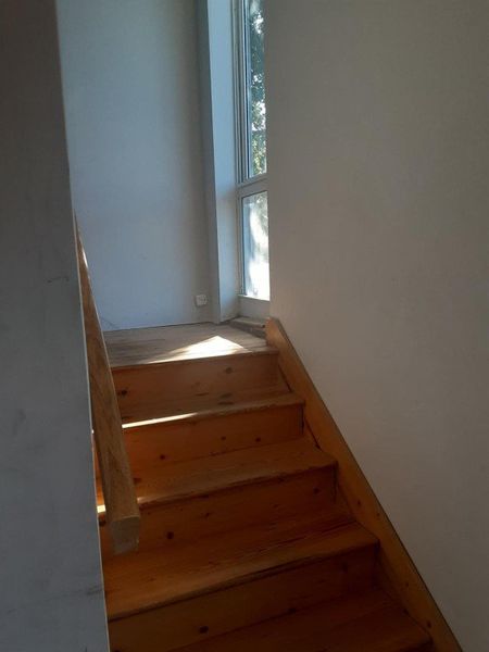Stairs next to front door