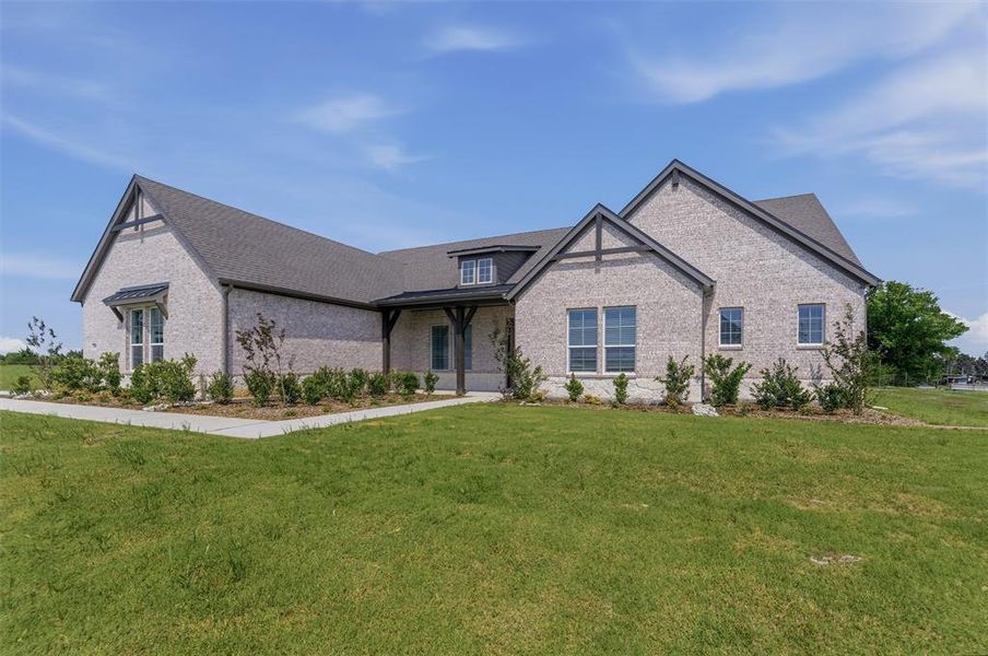 Front exterior of a new home in Grayson Ridge, Van Alstyne, TX, highlighting curb appeal (Image 19).
