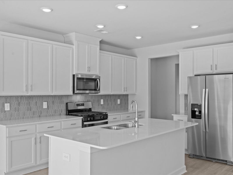 Furnished interior view inside a new home in The Farm at Wells Creek - Signature Collection, Gray Court (Image 4).