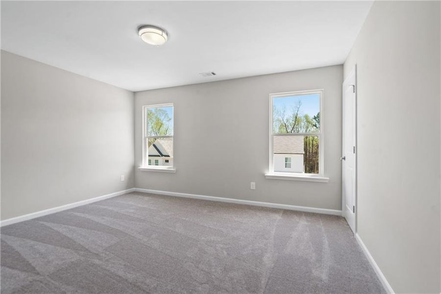 Spacious, unfurnished interior of a new home in Edenglen, Buford (Image 19).