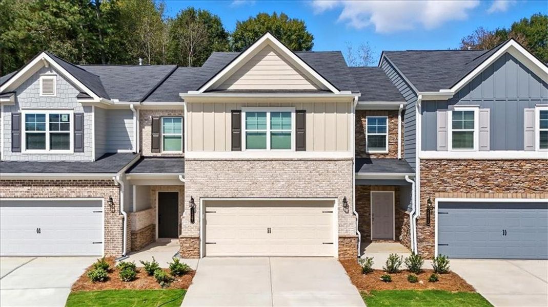 Front exterior of a new home in Park Center Pointe, Austell, GA, highlighting curb appeal (Image 1).