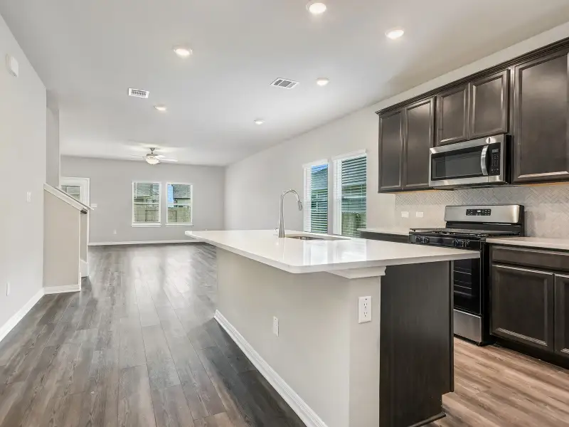 Furnished interior view inside a new home in Butler Farms - Reserve Collection, Liberty Hill (Image 3).