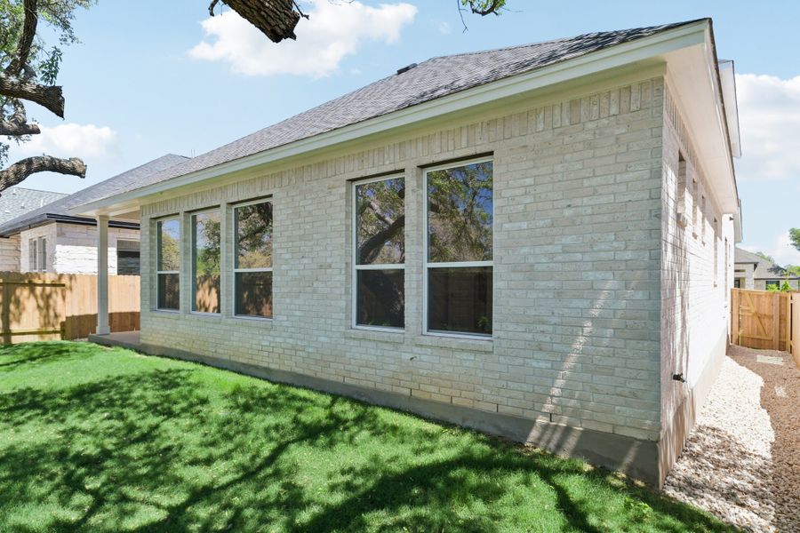 Exterior details and patio area of a home in Persimmon, Buda (Image 16).