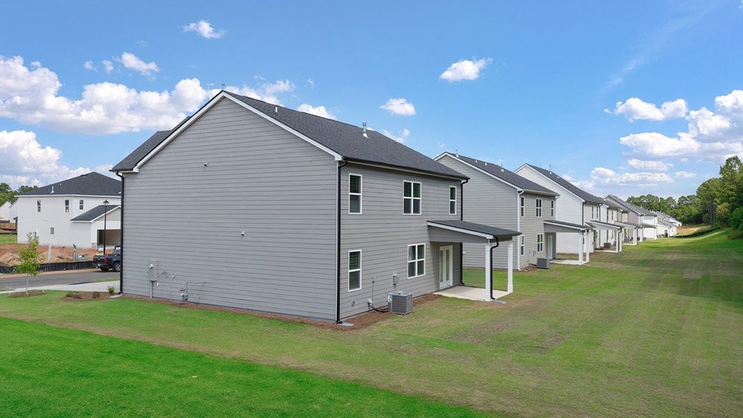 Exterior details and patio area of a home in The Preserve at Agricultural Village, Perry (Image 3).