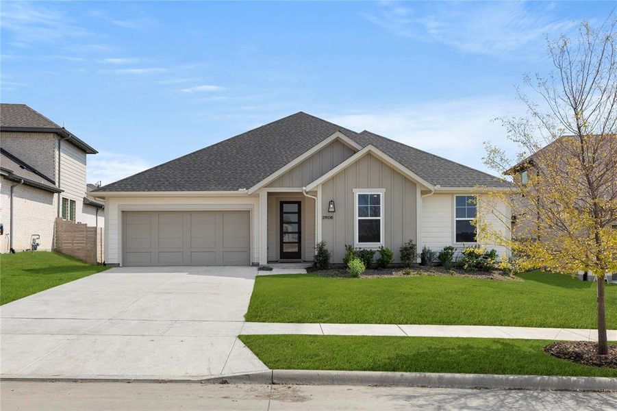 Front exterior of a new home in Inspiration Collection 60 at Painted Tree, McKinney, TX, highlighting curb appeal (Image 1). Front exterior of a new home in Inspiration Collection 60 at Painted Tree, McKinney, TX, highlighting curb appeal (Image 1).